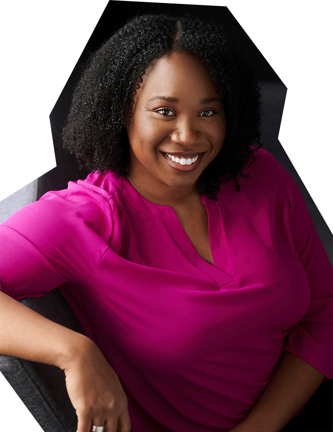 Photo of Bria Walker-Rhoze, a black woman with medium length black hair, wearing a fuchsia blouse and smiling.