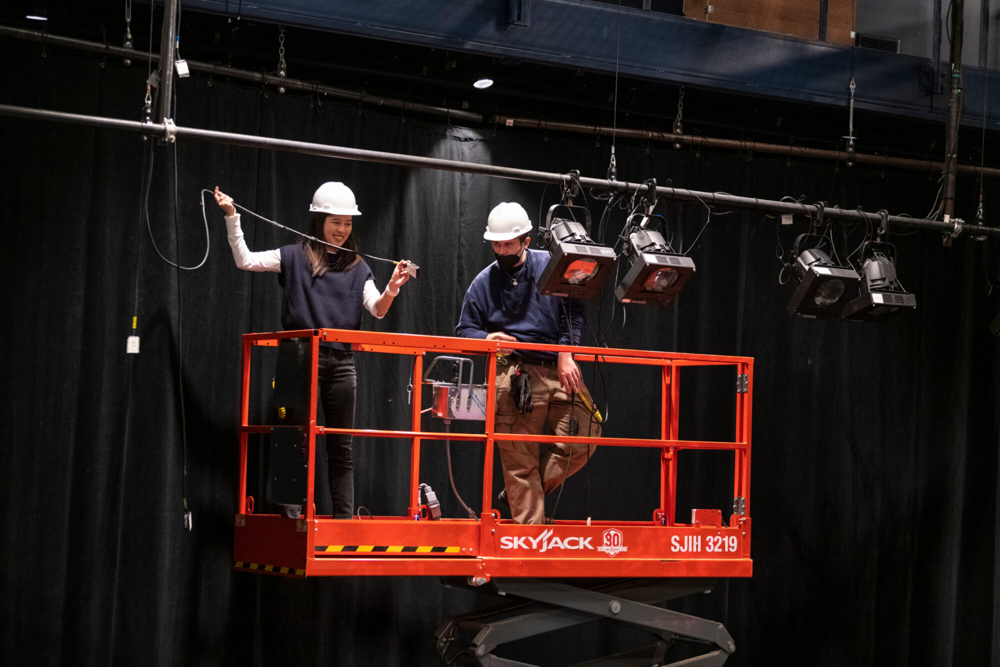 Students working on lighting load-in for the School of Drama’s production of “Dance Nation” in the Helen Wayne Rauh Studio Theater.