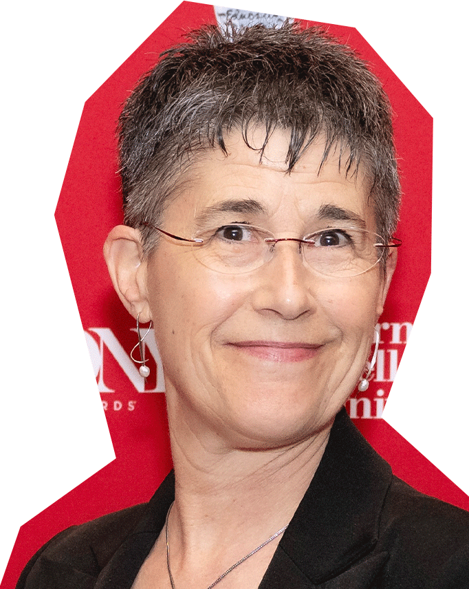 Photo of Wendy Arons, a white woman with short dark grey hair and glasses, wearing a black blazer.