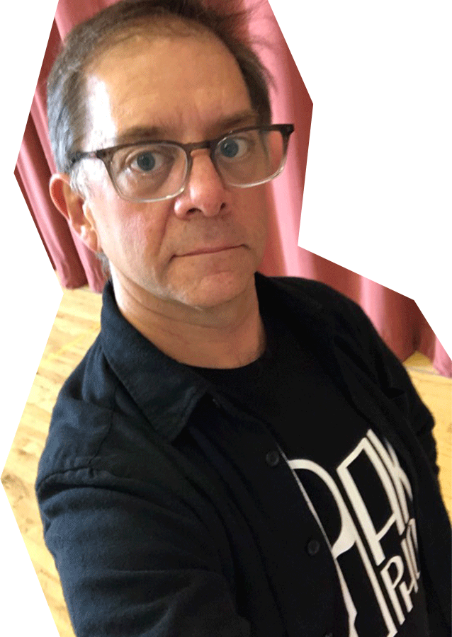 Photo of Rob Handel, a white man with brown hair and glasses, wearing a black shirt.