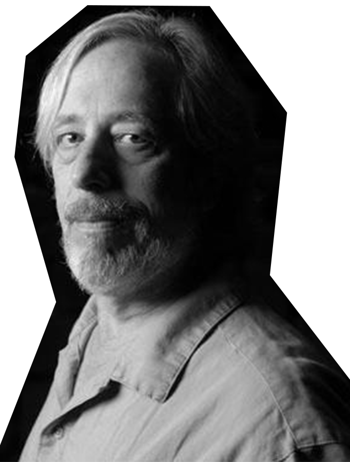 Black and white photo of Jed Harris, a man with white hair and a beard, wearing a collared shirt