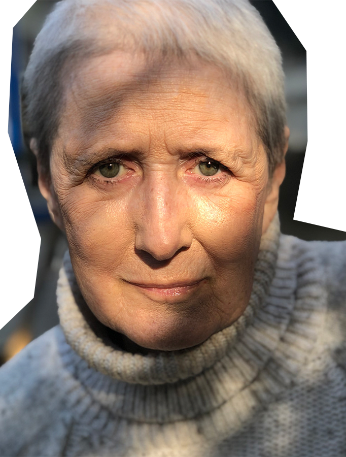 Photo of Barbara MacKenzie-Wood, a white woman with short white hair, wearing a turtleneck sweater.