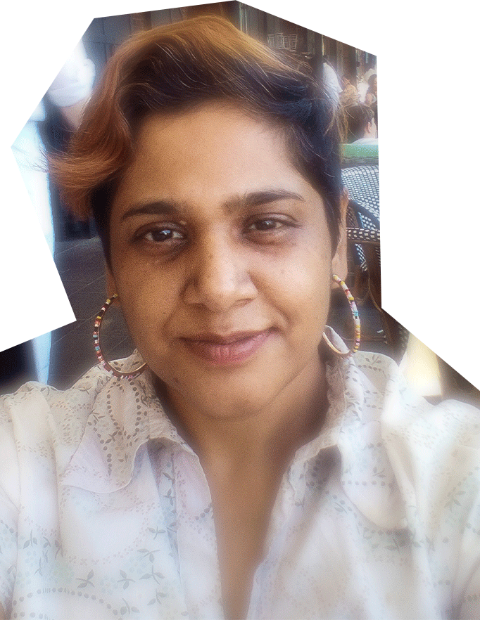 Photo of Sayantee Sahoo, an Indian woman with short dark hair, with a light streak, wearing large hoop earrings and a collared shirt.