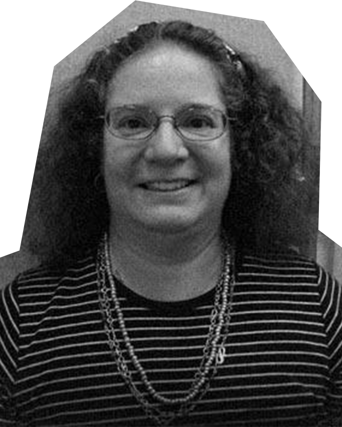 Black and white photo of Marlene Speranza, a woman with curly hair and glasses, wearing a black shirt with white stripes and a necklace.