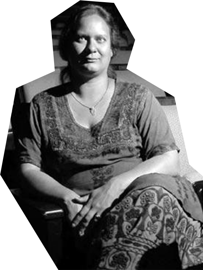 A black and white photo of Maria Stoy seated in theater seats in the Philip Chosky Theater at CMU.