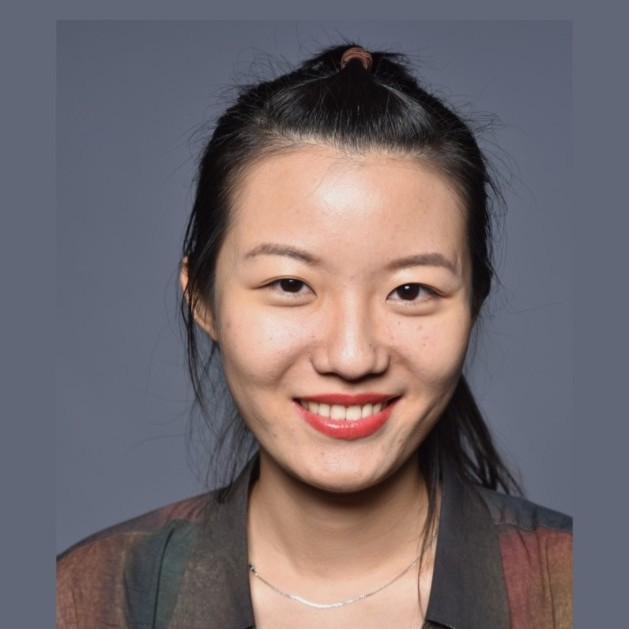 Photo of Yiran Zhang, an Asian woman with dark hair pulled back, smiling at the camera.