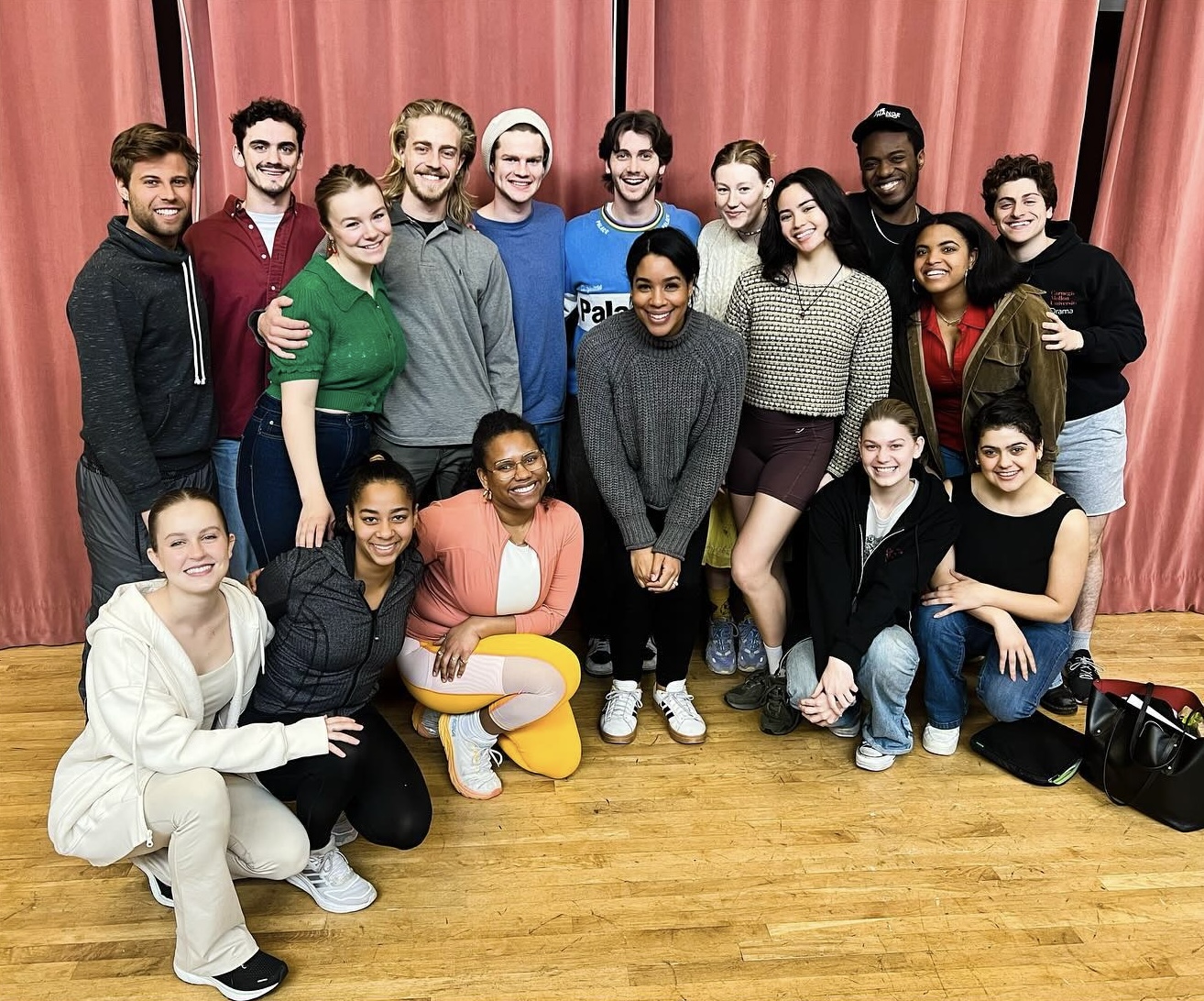 Group of students pose in an acting studio with Jesmille Darbouze.