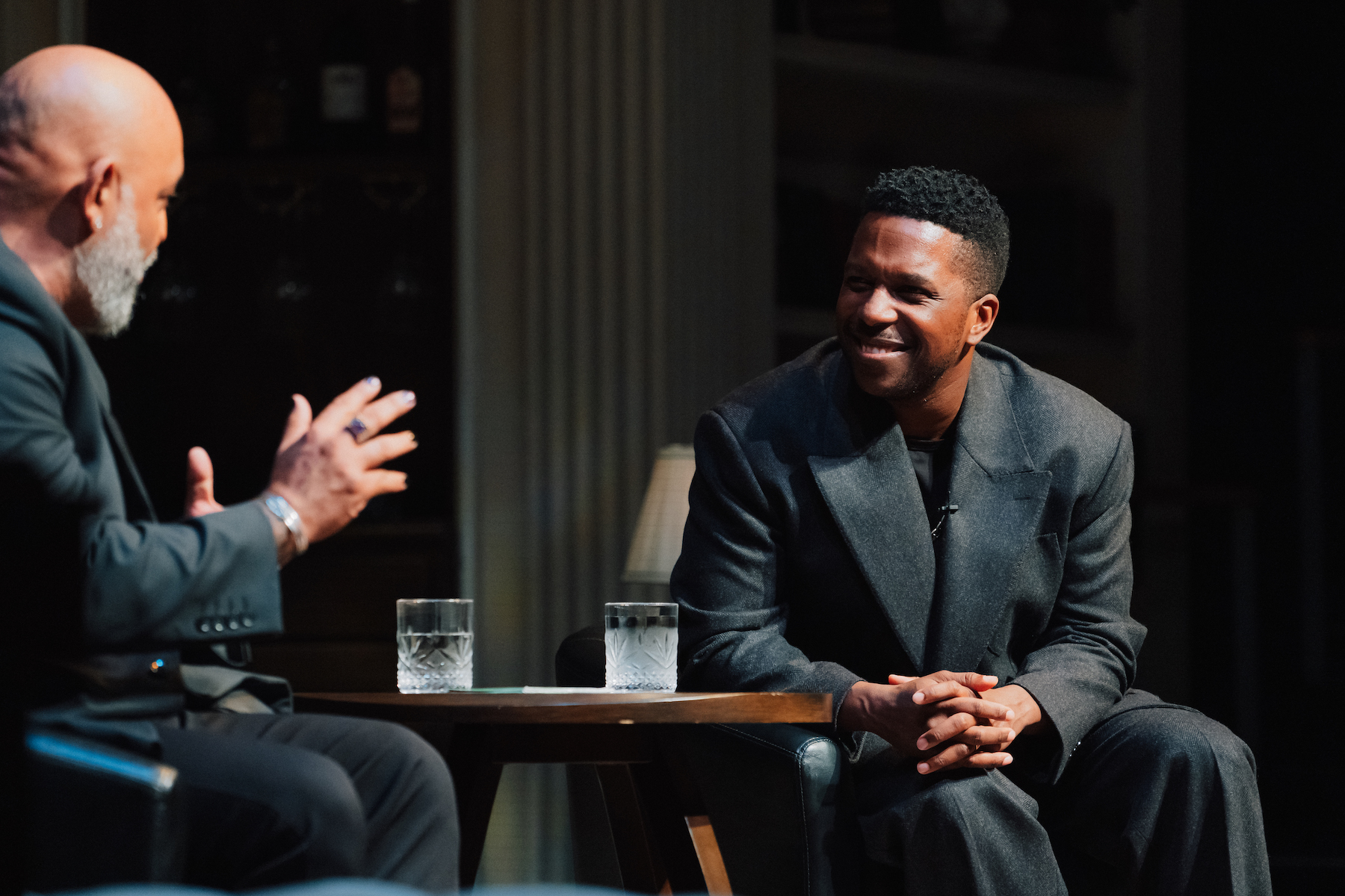 Robert Ramirez talks to Leslie Odom, Jr. on stage.