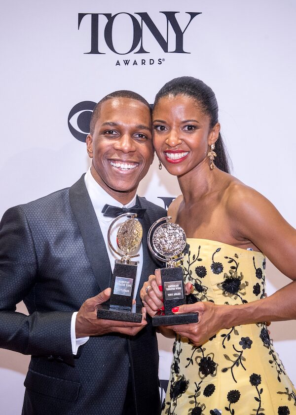 Leslie Odom, Jr. and Renée Elise Goldsberry holding their 2016 Tony Awards.