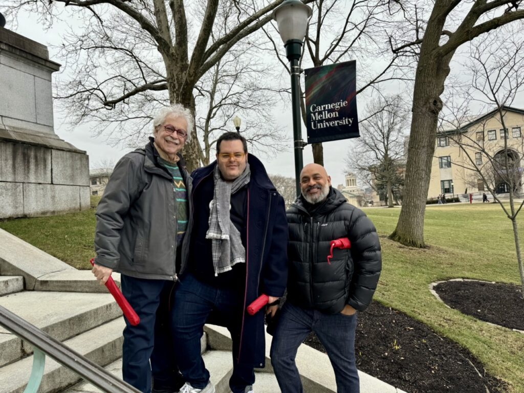 Dick Block, Josh Gad, and Robert Ramirez on CMU's campus.