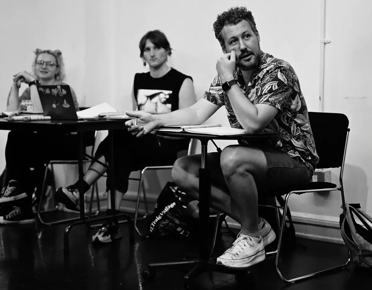 Black and white photo of director Benjamin Viertel in rehearsal
