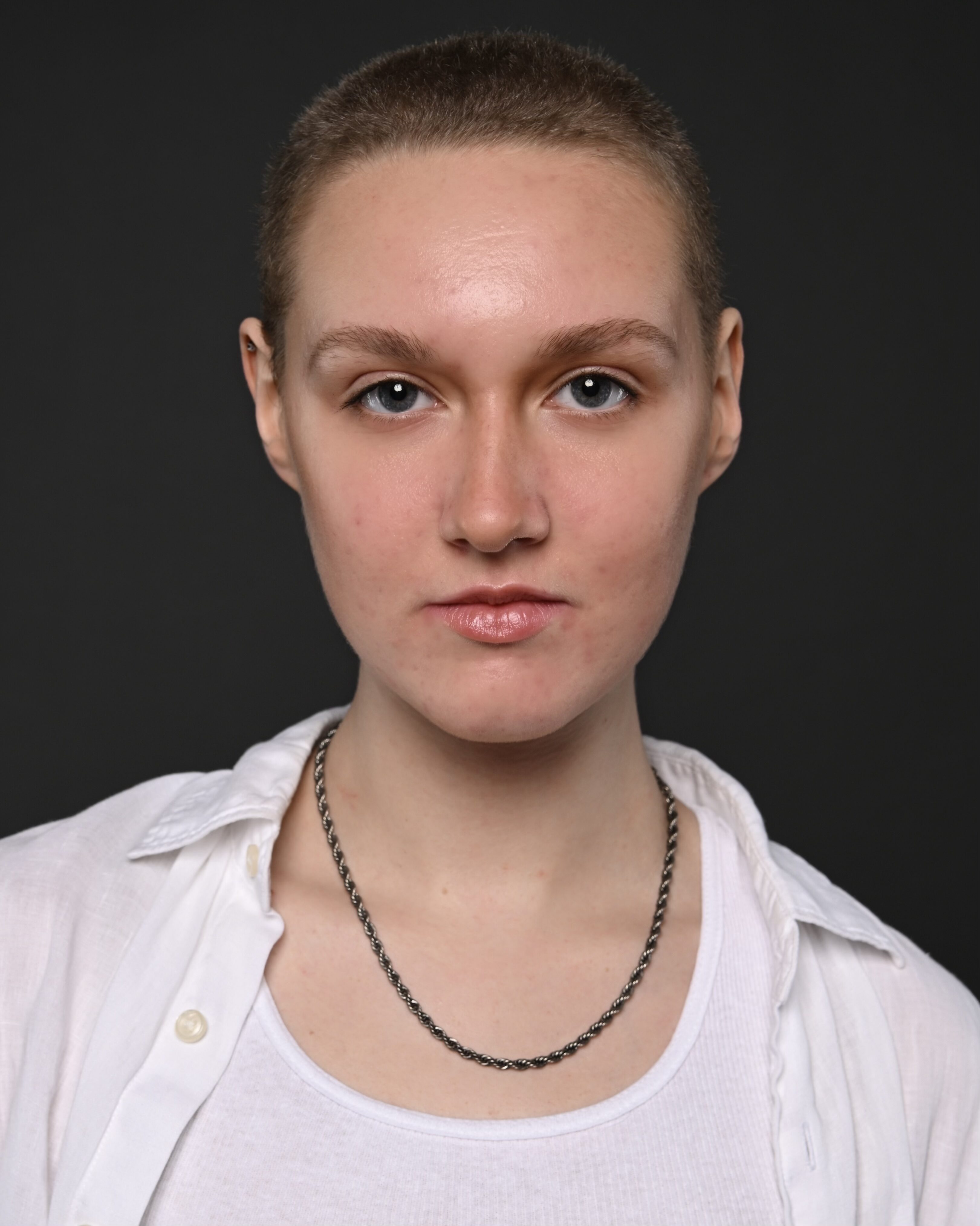 Headshot of James America Minta
