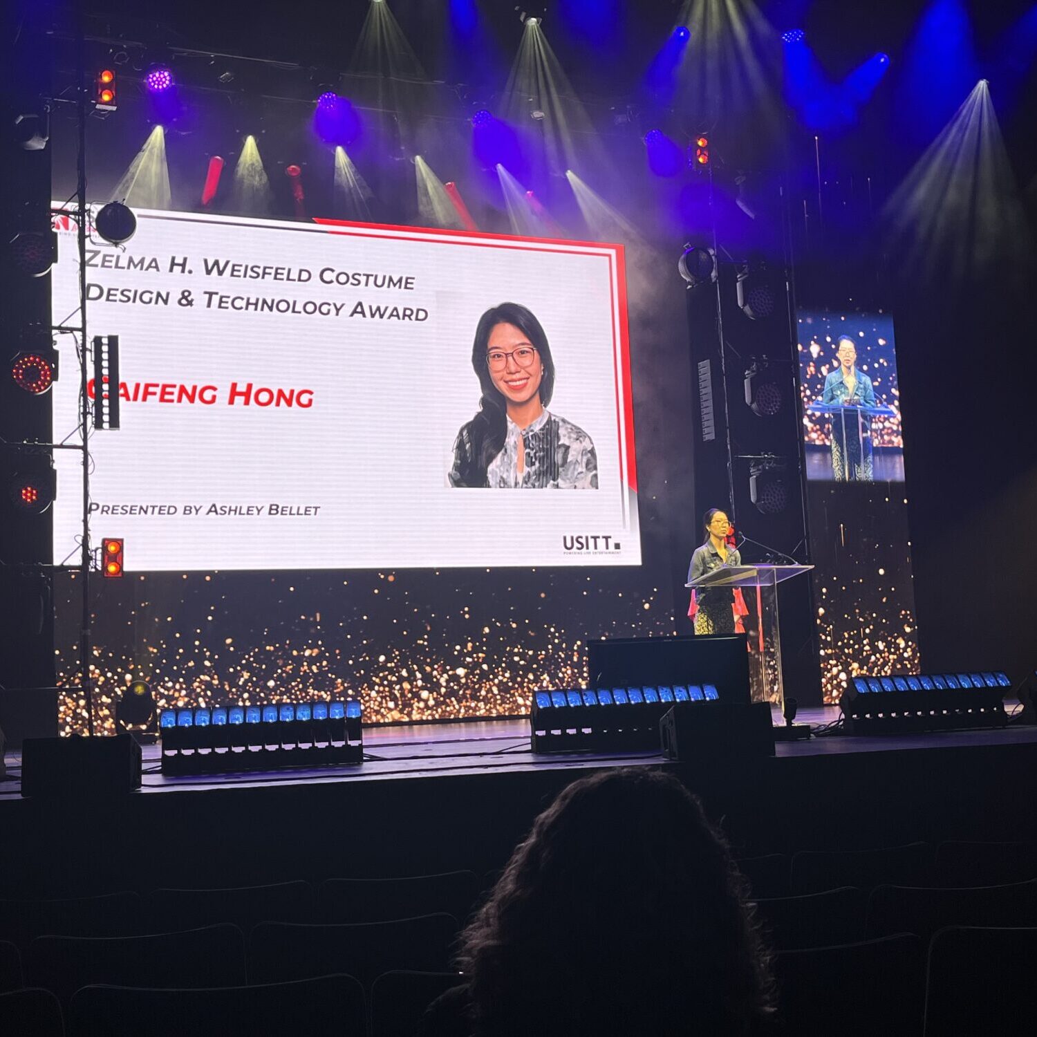 Caifeng Hong accepts a USITT Award