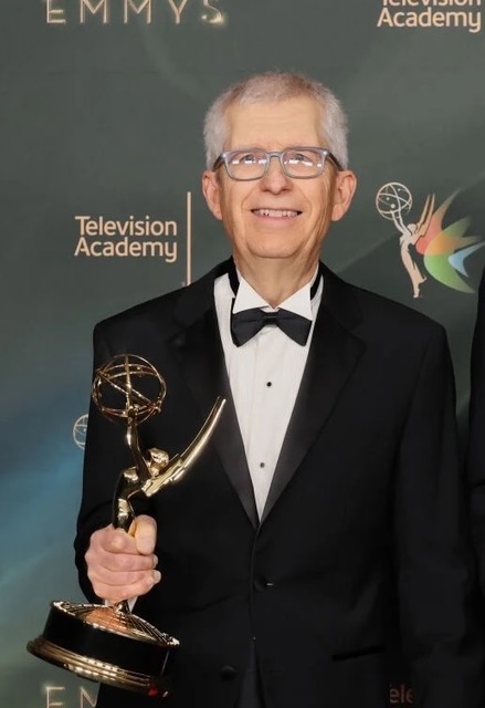Steve Arnold with Emmy Award